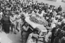 DRUM MAY 1967 – DAY OF MORNING – IRONSI IS ASSASSINATED NIGED:POLITICS:PERSONALITIES:MAY 1967 – Day Of Mourning – Ironsi Is Assassinated –Accompanied by a large crowd, officers carry the body of Lieutenant Colonel Fajuyi to his resting place. It was a solemn occasion, the most solemn that many Nigerians remember. Major-General Aguiyi-ironsi, former head of the federal military government and supreme commander of the armed forces, and Lieutenant-Colonel Adekunle Fajuyi, former military governor of Western Nigeria, were killed in Ibadan on July 29, 1966, by mutinous soldiers of the Nigerian army. The federal military government formally announced their death on Saturday, January 14, 1967, the eve of the first anniversary of the army mutiny. In deed, Major-General Aguiyi-Irons, and Lieutenant-Colonel Adekunle Fajuyi were mourned twice – privately by thousands on August 1, and officially, by thousands in January 1967. (Photograph by Drum Photographer ©BAHA)