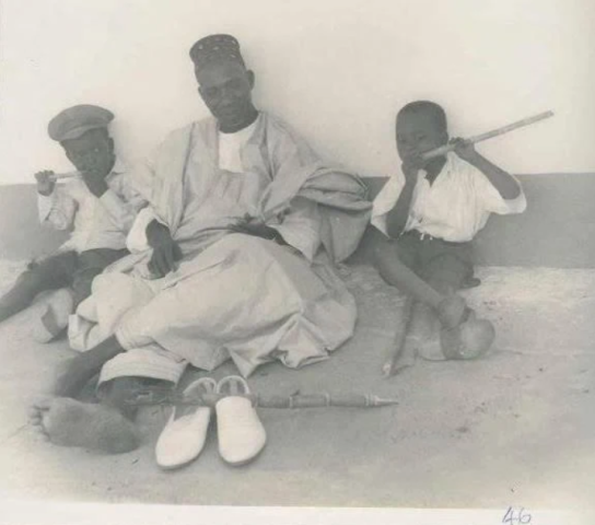 THE PRIME MINISTER SIR ABUBAKAR TAFAWA BALEWA WHO IS ON HIS ANNUALLEAVE RELAXATING WITH HIS CHILDREN IN HIS FARM HOUSE NEAR BAUCHI- 1963.