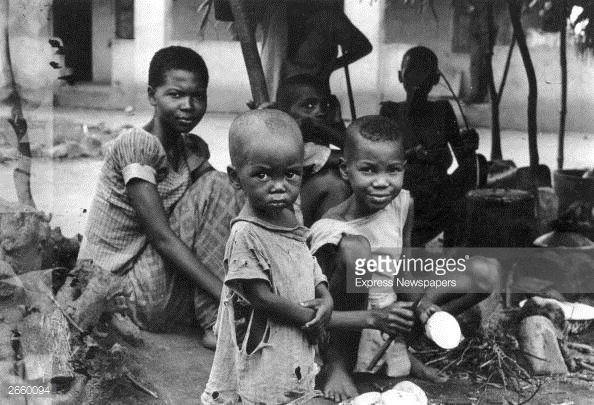 A starving Biafran family during the famine resulting from the Biafran War. (Photo by Express Newspapers